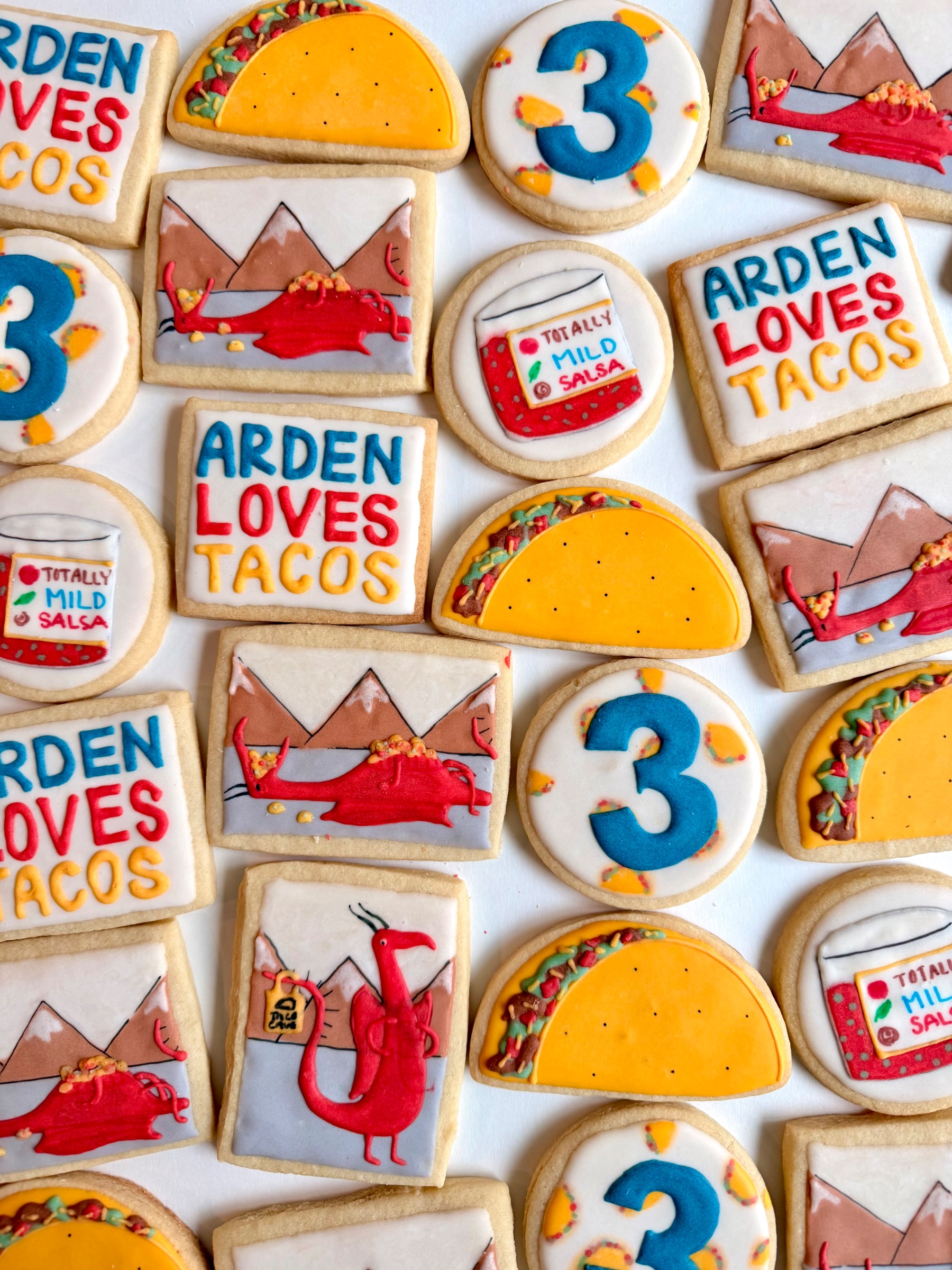 dragon and taco themed cookies
